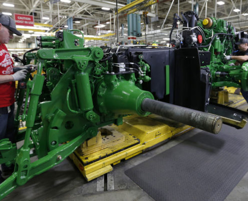 The John Deere team building the new 8245R John Deere Tractor